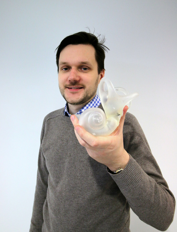 AMRC Project Engineer, Valdis Krumins with the first printed model.